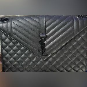 Black on black Yves Saint Laurent large envelope bag